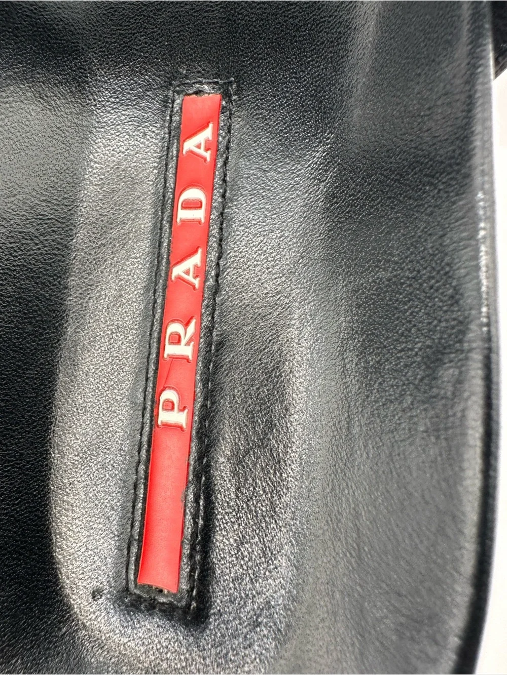 Prada Black Leather and Fabric Double-Strap Slides with Red Insole Detail